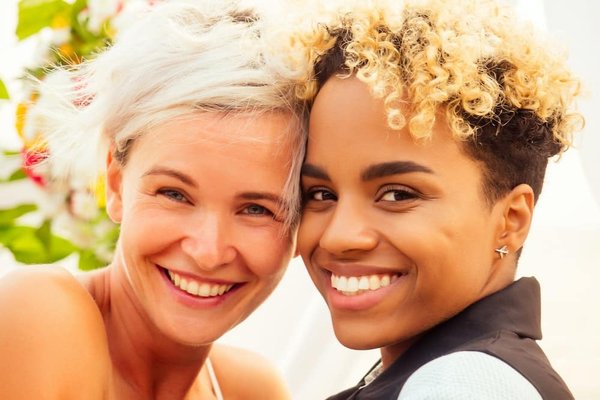 What role can UK public health officers play in improving vaccination uptake among migrant populations?